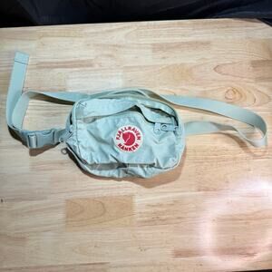 This mint green Fjällräven Kånken Hip Pack